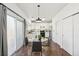 Dining area with glass top table adjacent to a bright kitchen at 14881 E 117Th Ave, Commerce City, CO 80603