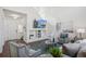 Comfortable living room with high ceilings and modern décor at 14881 E 117Th Ave, Commerce City, CO 80603
