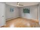 Serene bedroom with natural light and laminate flooring at 9209 William Cody Dr, Evergreen, CO 80439