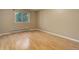Bedroom with laminate floors and large window at 9209 William Cody Dr, Evergreen, CO 80439