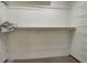 Walk-in closet features wire shelving for organization and ample storage space at 9209 William Cody Dr, Evergreen, CO 80439