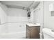 Bathroom featuring tile shower, vanity, and toilet, providing a functional space at 1038 9Th Ave, Longmont, CO 80501