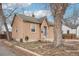 Quaint home featuring a unique blue door at 1038 9Th Ave, Longmont, CO 80501