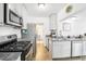 Well-equipped kitchen with stainless steel appliances and modern finishes at 1038 9Th Ave, Longmont, CO 80501