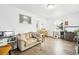 Bright living room featuring wood floors and a cozy seating area at 1038 9Th Ave, Longmont, CO 80501