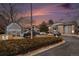 Exterior shot of West Gate Plaza West apartments on a colorful, cloudy day at 8025 W Eastman Pl # 2-102, Lakewood, CO 80227