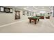 Spacious basement with billiards and recreation area at 9556 Kemper Dr, Lone Tree, CO 80124