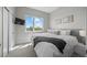 Bright bedroom features a large window, and comfortable modern decor at 3820 Jason St # 3, Denver, CO 80211