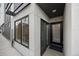Modern front entrance features sleek design and a welcoming entry at 3820 Jason St # 3, Denver, CO 80211