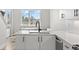 This is a view of the kitchen featuring an eat in nook and city views at 3820 Jason St # 3, Denver, CO 80211