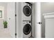 A new, stacked washer and dryer are tucked away behind closet doors at 3820 Jason St # 3, Denver, CO 80211