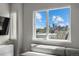 Living room features a cityscape view, modern furnishings, and bright, natural light at 3820 Jason St # 3, Denver, CO 80211