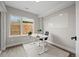 Bright home office with a large window, desk, modern lighting, and ample space for a productive work environment at 3820 Jason St # 3, Denver, CO 80211