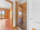 Shower with glass doors and detailed tile work, conveniently located next to the Primary bedroom at 11766 Coal Creek Heights Dr, Golden, CO 80403