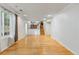 Open living space featuring hardwood floors, ample lighting, and a bright, airy ambiance at 18625 E Kent Dr, Aurora, CO 80013