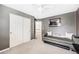 Cozy bedroom featuring plush carpeting, closet, and natural light at 5265 S Cathay Way, Centennial, CO 80015