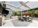 Outdoor patio with modern pergola and dining table at 5265 S Cathay Way, Centennial, CO 80015