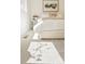 Brightly lit bedroom showcasing a comfortable bed and serene ambiance at 2105 S Galapago St # 4, Denver, CO 80223