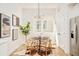 Cozy dining area featuring a round table, modern chandelier, and stylish decor at 2105 S Galapago St # 4, Denver, CO 80223