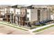 Modern townhomes boast sleek designs, balconies, and a landscaped corner lot at 2105 S Galapago St # 4, Denver, CO 80223