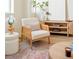 Comfortable chair paired with stylish decor in this inviting living space at 2105 S Galapago St # 4, Denver, CO 80223