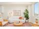 Bright living room with modern furnishings and a minimalist aesthetic at 2105 S Galapago St # 4, Denver, CO 80223