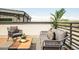 Charming rooftop deck with cozy seating, perfect for enjoying the outdoors at 2105 S Galapago St # 4, Denver, CO 80223
