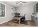 Home office with built-in cabinetry and window views at 3214 Heron Lakes Pkwy, Berthoud, CO 80513