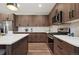 Well-appointed kitchen showcasing stainless steel appliances, marble counters, and modern cabinetry at 4127 Tejon St, Denver, CO 80211