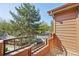 Balcony with wooded view, offering a peaceful outdoor retreat for relaxation at 9455 W 81St Ave # A, Arvada, CO 80005