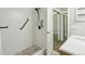 Modern bathroom showcasing a walk-in shower with black hardware and updated fixtures at 9455 W 81St Ave # A, Arvada, CO 80005