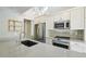 Kitchen showcasing stainless steel appliances, quartz countertop, pendant lighting and cabinetry at 9455 W 81St Ave # A, Arvada, CO 80005