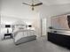 Bedroom with neutral tones, ceiling fan, carpet, closet, and blackout blinds at 345 Fillmore # 407, Denver, CO 80206
