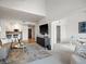 Open concept living room flows into the kitchen and office space at 345 Fillmore # 407, Denver, CO 80206