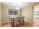 Dining room with hardwood floors, natural light, and modern decor at 8970 Garland Ct, Westminster, CO 80021