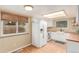 Bright kitchen features white cabinets, butcher block countertops, stainless appliances, and hardwood floors at 8970 Garland Ct, Westminster, CO 80021