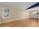 Spacious room with hardwood floors, a bright window, and potential for dining area setup at 8970 Garland Ct, Westminster, CO 80021