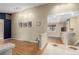 Open floor plan showcasing hardwood floors, neutral walls, and seamless transition to the lower level at 8970 Garland Ct, Westminster, CO 80021