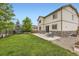 Expansive backyard features lush green grass, perfect for relaxation and outdoor activities at 6108 S Harvest Ct, Aurora, CO 80016
