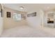 Inviting bedroom with soft carpet and abundant natural light from a bright window at 6108 S Harvest Ct, Aurora, CO 80016