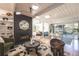 Living room with a black brick fireplace and hardwood floors at 1398 S Fairfax St, Denver, CO 80222