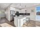 Modern kitchen with stainless steel appliances and island at 1401 Jackson St # 204, Golden, CO 80401