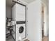 Convenient laundry room with stackable washer and dryer at 1401 Jackson St # 204, Golden, CO 80401