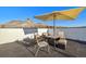 Private rooftop deck with seating area and mountain views at 1401 Jackson St # 204, Golden, CO 80401