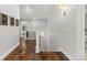 Bright hallway with hardwood floors and staircase leading to bedrooms at 1350 E Greenwood Ln, Greenwood Village, CO 80121