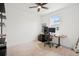 Bedroom featuring neutral carpet and a work space; ideal for remote work or a hobby space at 12270 W 57Th Ave, Arvada, CO 80002