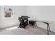 Bonus room featuring a window, chair, desk, and simulated driving set up at 12270 W 57Th Ave, Arvada, CO 80002