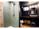 Stylish bathroom featuring updated shower, modern toilet, and contemporary vanity at 8276 E Easter Pl, Centennial, CO 80112