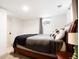 Comfortable bedroom offers a relaxing retreat with a large bed and serene atmosphere at 8276 E Easter Pl, Centennial, CO 80112
