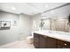 Spa-like bathroom with marble finishes and a walk-in shower at 2837 Vallejo St # 108, Denver, CO 80211